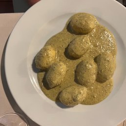 Gnocchi. It has cheese in the middle and pesto sauce and it's the best I've ever had.