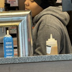 Dunkin' - This is one of the workers who was working behind the counter, wearing beats headphones.