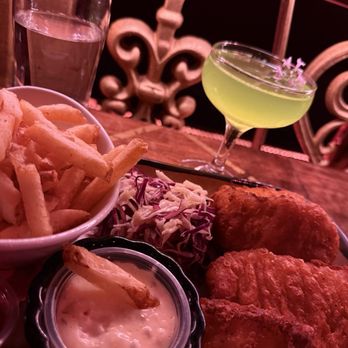 Can Can Culinary Cabaret - Fish and chips appetizer and green fairy cocktail - French Near Me - Seattle, Washington