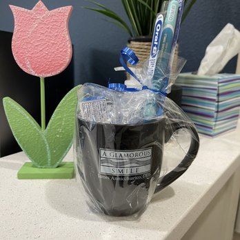 A Glamorous Smile - Super cute welcome gift for new patients (mug, toothbrush, toothpaste etc) - Endodontists Near Me - Trinity, Florida
