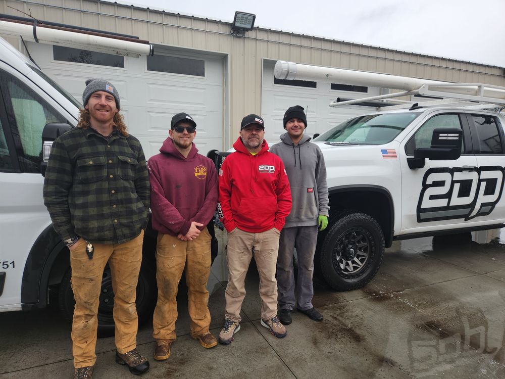 Slide of Two Dogs Plumbing and Drain Cleaning