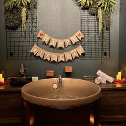 Oakwell Beer Spa - How cute is this birthday set up?! Rose pedals, candles, a birthday banner and the most amazing chocolates