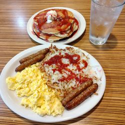 Pancakes R US - SCRAMBLED EGGS WITH HASH BROWNS, FOUR SAUSAGE AND THREE BUTTERMILK  PANCAKES.