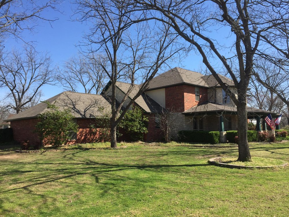 Slide of Andis Roofing & Remodeling