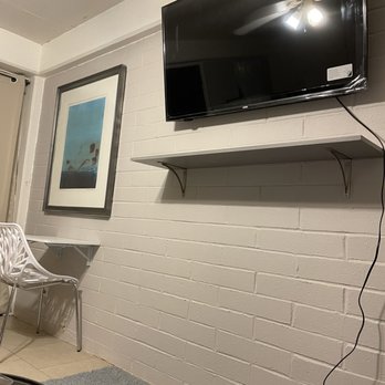 Handyman Dave - Brick wall painted, TV Mounted, shelf, desk and painting installed in record time! - Handyman Near Me - Honolulu, Hawaii Handyman Dave - Brick wall painted, TV Mounted, shelf, desk and painting installed in record time! - Handyman Near Me - Honolulu, Hawaii
