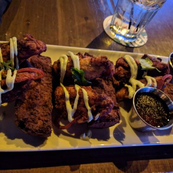 Lucky Strike Honolulu - Nasty blackened chalky, soggy chicken wings and Burt waffle, soggy middle sticks - Arcades Near Me - Honolulu, Hawaii