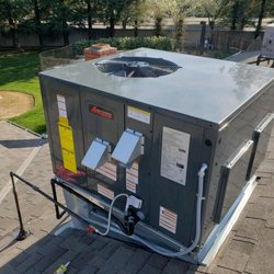 Bennett Air Conditioning - New unit installed on client's roof. 2/3