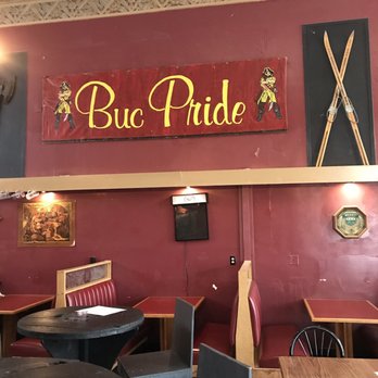 Oswald Brewing Company - a red wall with a sign that says bud pride - Breweries Near Me - Blue Earth, Minnesota Oswald Brewing Company - a red wall with a sign that says bud pride - Breweries Near Me - Blue Earth, Minnesota