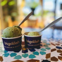 Bigdash Ice Cream & Pastries - -1 scoop each of Pistachio and Vanilla Ice Cream on the left -1 scoop of Pistachio on the right