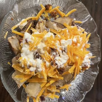 Burg Steakhouse - My baked potato from the salad bar. - Steakhouses Near Me - Gatlinburg, Tennessee Burg Steakhouse - My baked potato from the salad bar. - Steakhouses Near Me - Gatlinburg, Tennessee