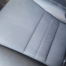 Bits stuck inside the perforated leather.