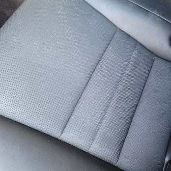 Ride on Drive - Bits stuck inside the perforated leather. - Auto Detailing Near Me