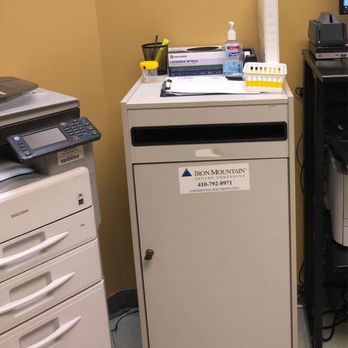 Labcorp - urine sample on top of shredder where they are asking patients to sign credit card forms. - Laboratory Testing Near Me - Greenbelt, Maryland