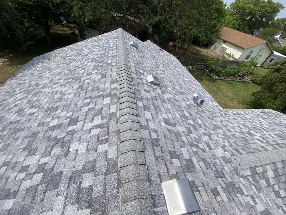Slide of A Banda M Roofing