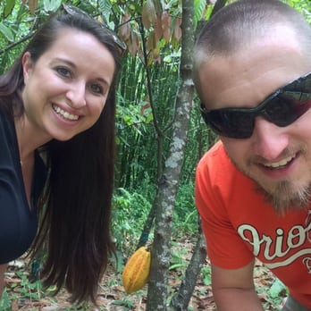 Lydgate Farms - Me and my wife in front of a cacao pod - Botanical Gardens Near Me - Kapaa, Hawaii Lydgate Farms - Me and my wife in front of a cacao pod - Botanical Gardens Near Me - Kapaa, Hawaii