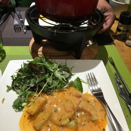 Tomato cheese fondue and potatoes. Tomato cheese fondue and potatoes.