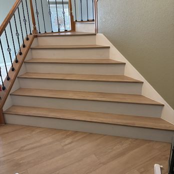 Flooring Kings - Laminate staircase with white risers - Flooring Near Me - Hemet, California Flooring Kings - Laminate staircase with white risers - Flooring Near Me - Hemet, California