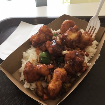 Thai Express - a tray of food with rice and chicken - Thai Near Me - Montreal, Quebec Thai Express - a tray of food with rice and chicken - Thai Near Me - Montreal, Quebec