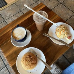 Cozy Bean Bakery & Cafe - Pizza bun and bacon chive scone, drinking a cozy latte and iced mocha