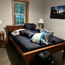 Fairy Stone State Park - Bedroom with queen size bed. Pillows are included. Area to hand clothes on a hanger. Bring your bedding.