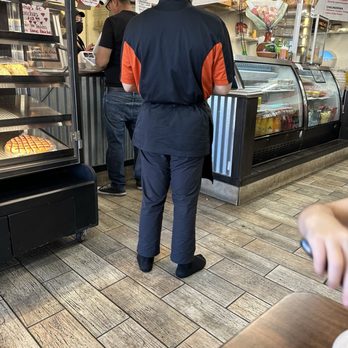 Tacos Huicho - Huicho Cook with no shoes on. - Mexican Near Me - Phoenix, Arizona