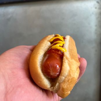Gatti’s H.O.G. - ows a hand holding a hotdog with mustard and mustard - Hot Dogs Near Me - Charleston, South Carolina Gatti’s H.O.G. - ows a hand holding a hotdog with mustard and mustard - Hot Dogs Near Me - Charleston, South Carolina