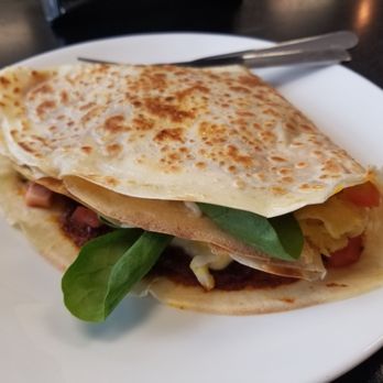 Kaffe Crepe - SICILIAN CREPE Cheese blend, sun-dried tomatoes pesto, fresh tomatoes, fetta cheese, scrambled eggs, and spinach - Creperies Near Me - Reno, Nevada Kaffe Crepe - SICILIAN CREPE Cheese blend, sun-dried tomatoes pesto, fresh tomatoes, fetta cheese, scrambled eggs, and spinach - Creperies Near Me - Reno, Nevada