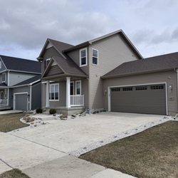 Friendly Landscaping - Another angle of front of the house.