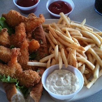 Paulie's - shrimp poboy with fries - Sandwiches Near Me - Houston, Texas