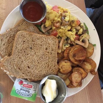 Van Gogh's Eeterie - Mushroom scramble with tomato on a bed of baby spinach... - Breakfast & Brunch Near Me - Springfield, Missouri Van Gogh's Eeterie - Mushroom scramble with tomato on a bed of baby spinach... - Breakfast & Brunch Near Me - Springfield, Missouri