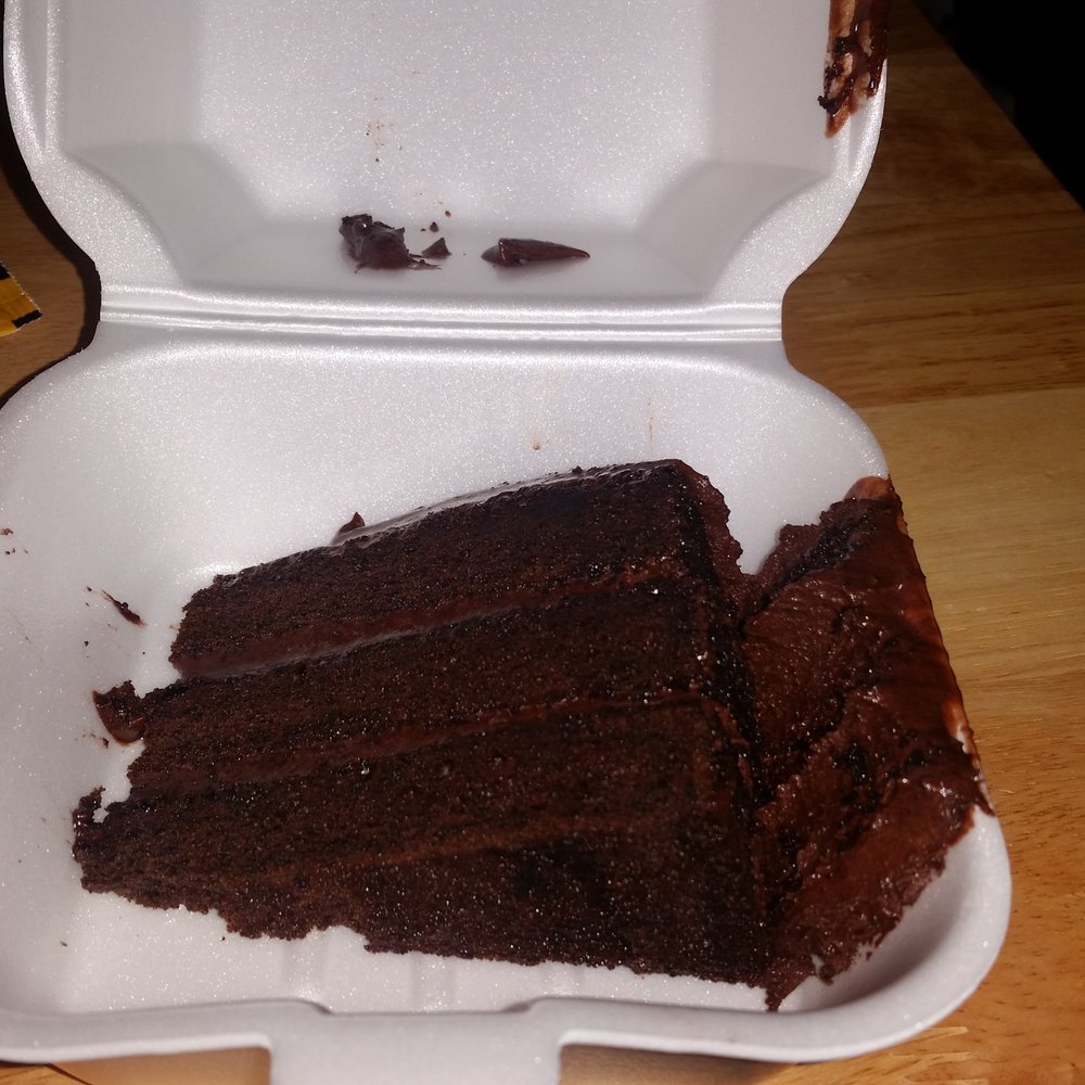 Off the Grill - Chocolate cake with icing on the box and off the cake - American Near Me - Maryland Heights, Missouri Off the Grill - Chocolate cake with icing on the box and off the cake - American Near Me - Maryland Heights, Missouri