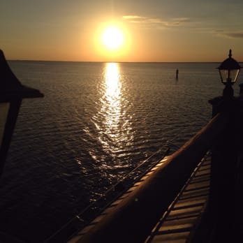 The Captain's Table - here's the view from the patio seating at sunset - Seafood Near Me - Punta Gorda, Florida The Captain's Table - here's the view from the patio seating at sunset - Seafood Near Me - Punta Gorda, Florida
