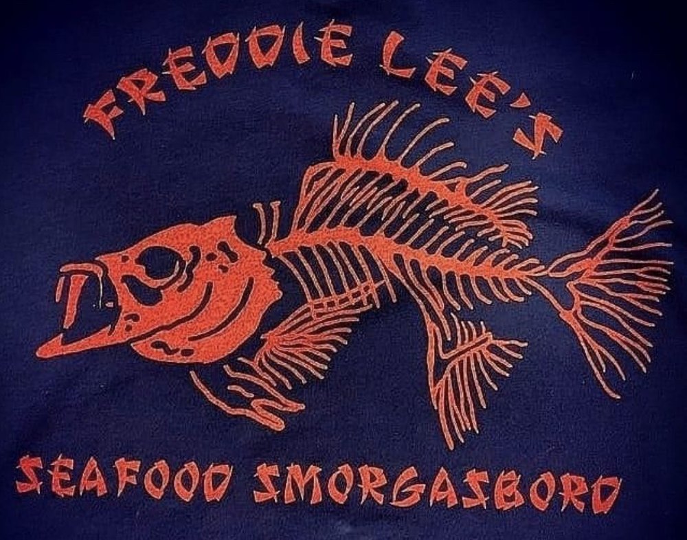 Freddie Lee’s Seafood Smorgasbord Logo