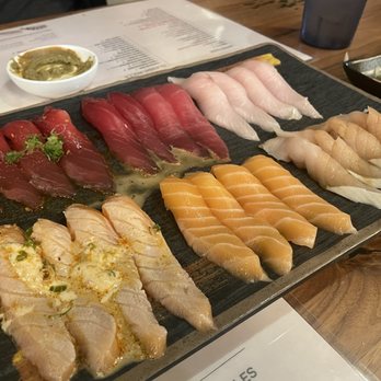 Mad For Sushi - The first half of the nigiri, left to right then below: garlic tuna, tuna, hai but, seared salmon, salmon escarole. - Sushi Bars Near Me - Dublin, California