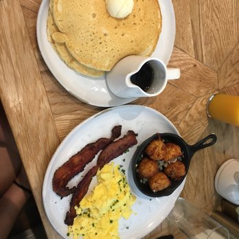Magnolia Table - The pancake breakfast with homemade tator tits, bacon and eggs. - Breakfast & Brunch Near Me - Waco, Texas Magnolia Table - The pancake breakfast with homemade tator tits, bacon and eggs. - Breakfast & Brunch Near Me - Waco, Texas