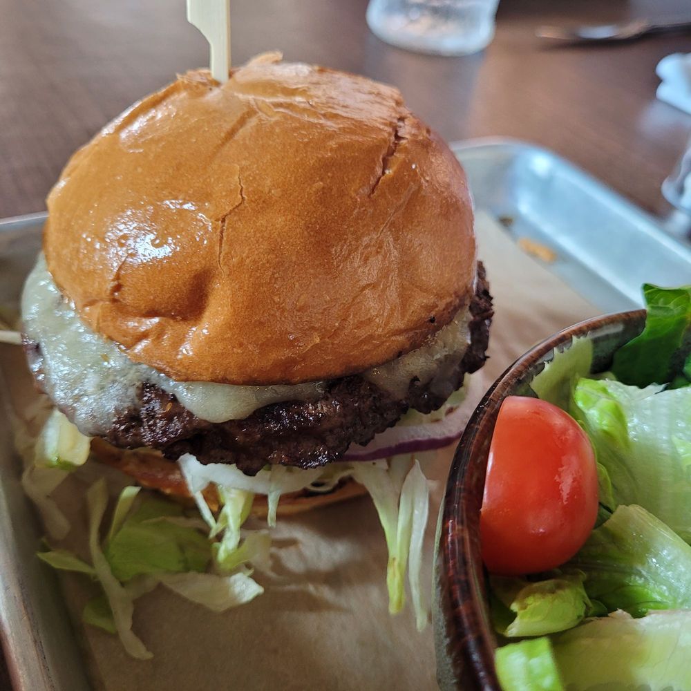 7 Mile Kitchen - Cheeseburger patty was just a little over cooked... perhaps under the warmer lights... - New American Near Me - Carlsbad, California