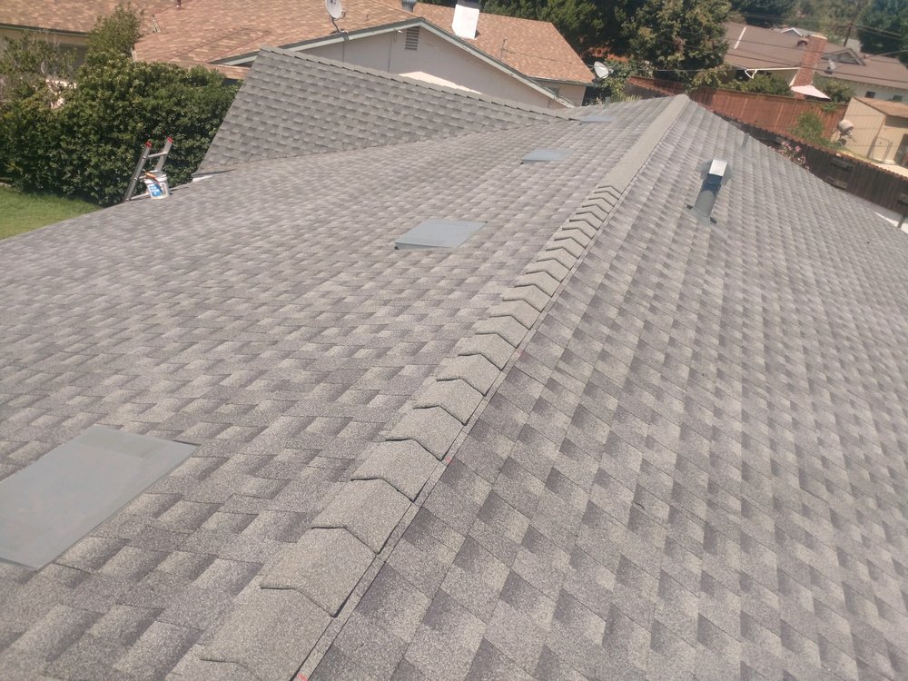 Slide of Delcid Roofing