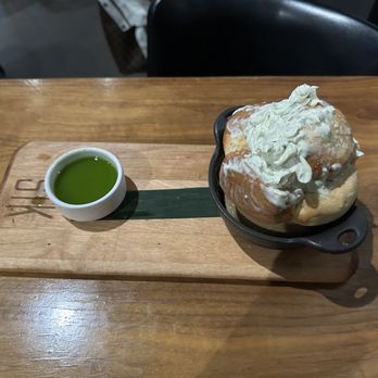 STK Steakhouse - Fresh baked bread with generous butter on top with dipping sauce - Bars Near Me - Denver, Colorado STK Steakhouse - Fresh baked bread with generous butter on top with dipping sauce - Bars Near Me - Denver, Colorado