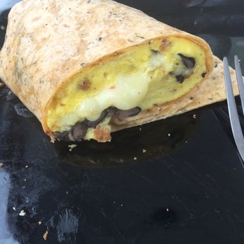 Lake Front Hotel - Breakfast burrito (clearly I was too hungry to take the picture before eating the other half) - American Near Me - Cooperstown, New York Lake Front Hotel - Breakfast burrito (clearly I was too hungry to take the picture before eating the other half) - American Near Me - Cooperstown, New York