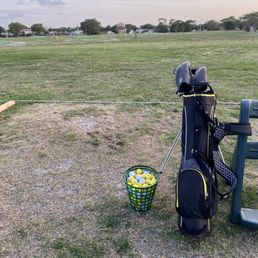 Driving range grass is pretty beat up Driving range grass is pretty beat up