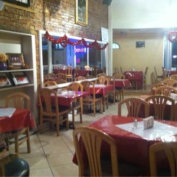 Compas Restaurant - tables and chairs with red tablecloths - Latin American Near Me - Middletown, New York Compas Restaurant - tables and chairs with red tablecloths - Latin American Near Me - Middletown, New York