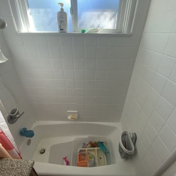 24 Hour Bath - Before. Odd matte painted tile and cracking tub. - Refinishing Services Near Me - Carson, California