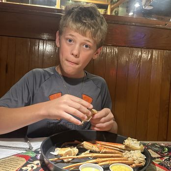 Boudreau & Thibodeau's Cajun Cookin' - A grandson living him some crab legs - Cajun/Creole Near Me - Houma, Louisiana Boudreau & Thibodeau's Cajun Cookin' - A grandson living him some crab legs - Cajun/Creole Near Me - Houma, Louisiana