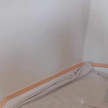 Paint It Right - Summary view of repaired and repainted staircase wall. - Painters Near Me - Ann Arbor, Michigan