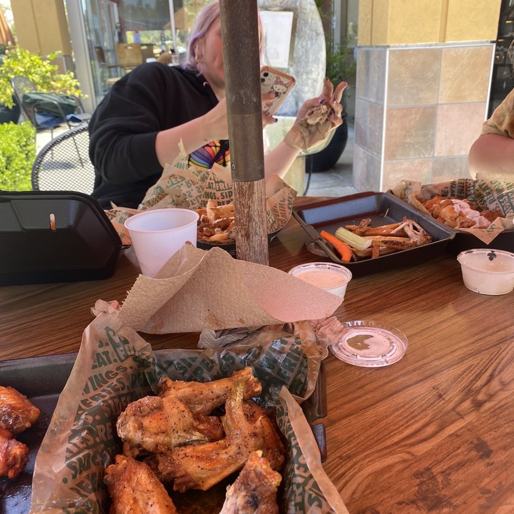 Wingstop - As you can see I already ate one! Couldn't wait - Chicken Wings Near Me - Lake Forest, California Wingstop - As you can see I already ate one! Couldn't wait - Chicken Wings Near Me - Lake Forest, California