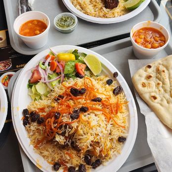 Afghan Cuisine - Manto, lamb shank qabili, flat bread, chicken peas - Afghan Near Me - Richmond, Virginia Afghan Cuisine - Manto, lamb shank qabili, flat bread, chicken peas - Afghan Near Me - Richmond, Virginia