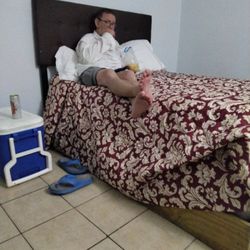 Surfside Anchor Motel - I moved the nightstand to by the window to look at the twinkling light outside & recharge my devices. Clean room for $80