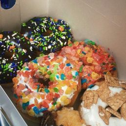 Fruity pebble donuts, Cinnamon Toast Crunch donut, chocolate with sprinkles donut Fruity pebble donuts, Cinnamon Toast Crunch donut, chocolate with sprinkles donut