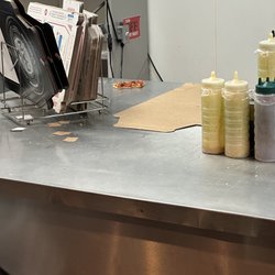 Domino's Pizza - Half eaten pizza from an employee, eaten while cooking food for customers and without washing hands in between.