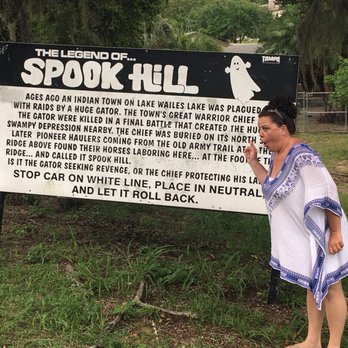 Spook Hill - Standing by the Spook Hill sign - Landmarks & Historical Buildings Near Me - Lake Wales, Florida Spook Hill - Standing by the Spook Hill sign - Landmarks & Historical Buildings Near Me - Lake Wales, Florida